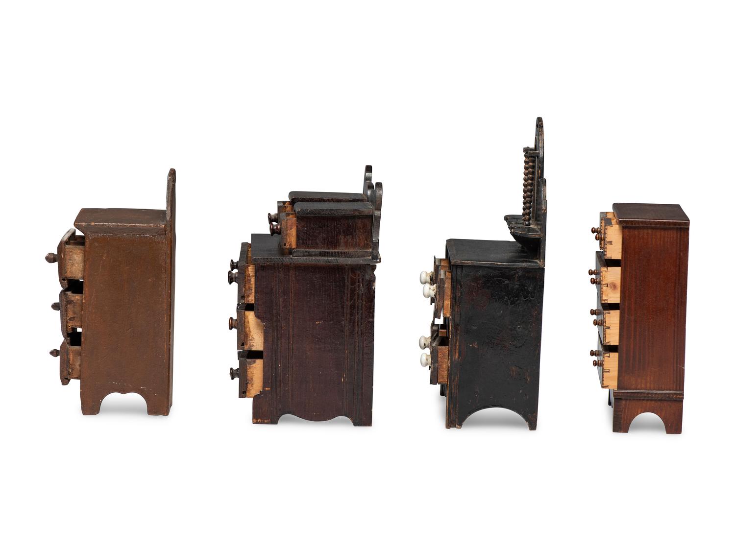 Four Painted or Stained Miniature Chests of Drawers