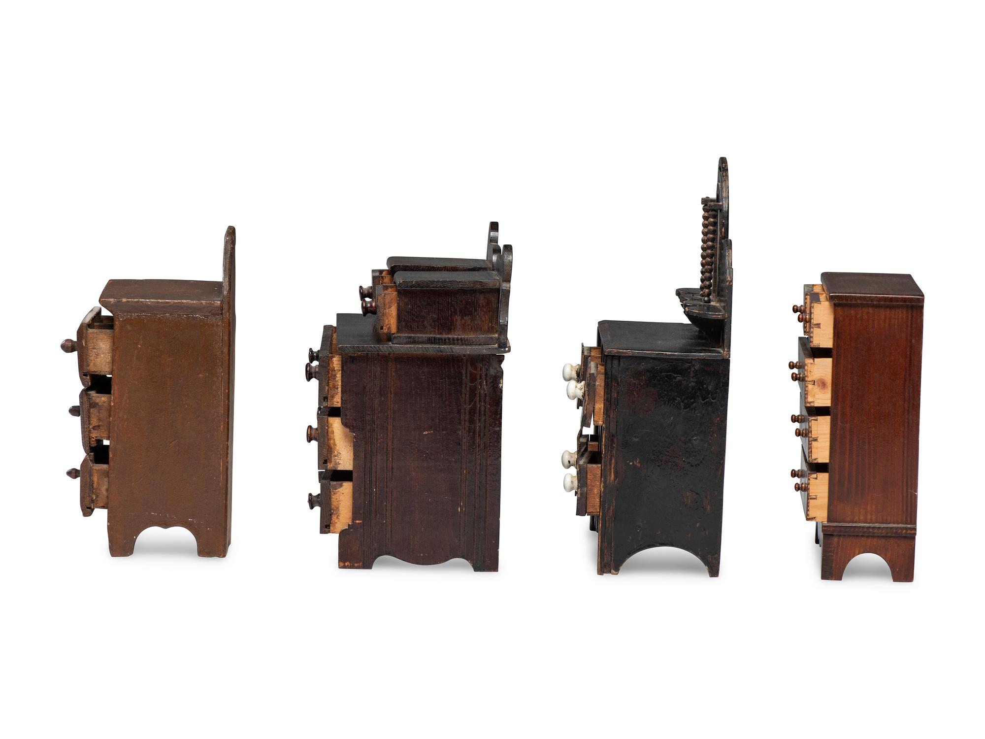 Four Painted or Stained Miniature Chests of Drawers