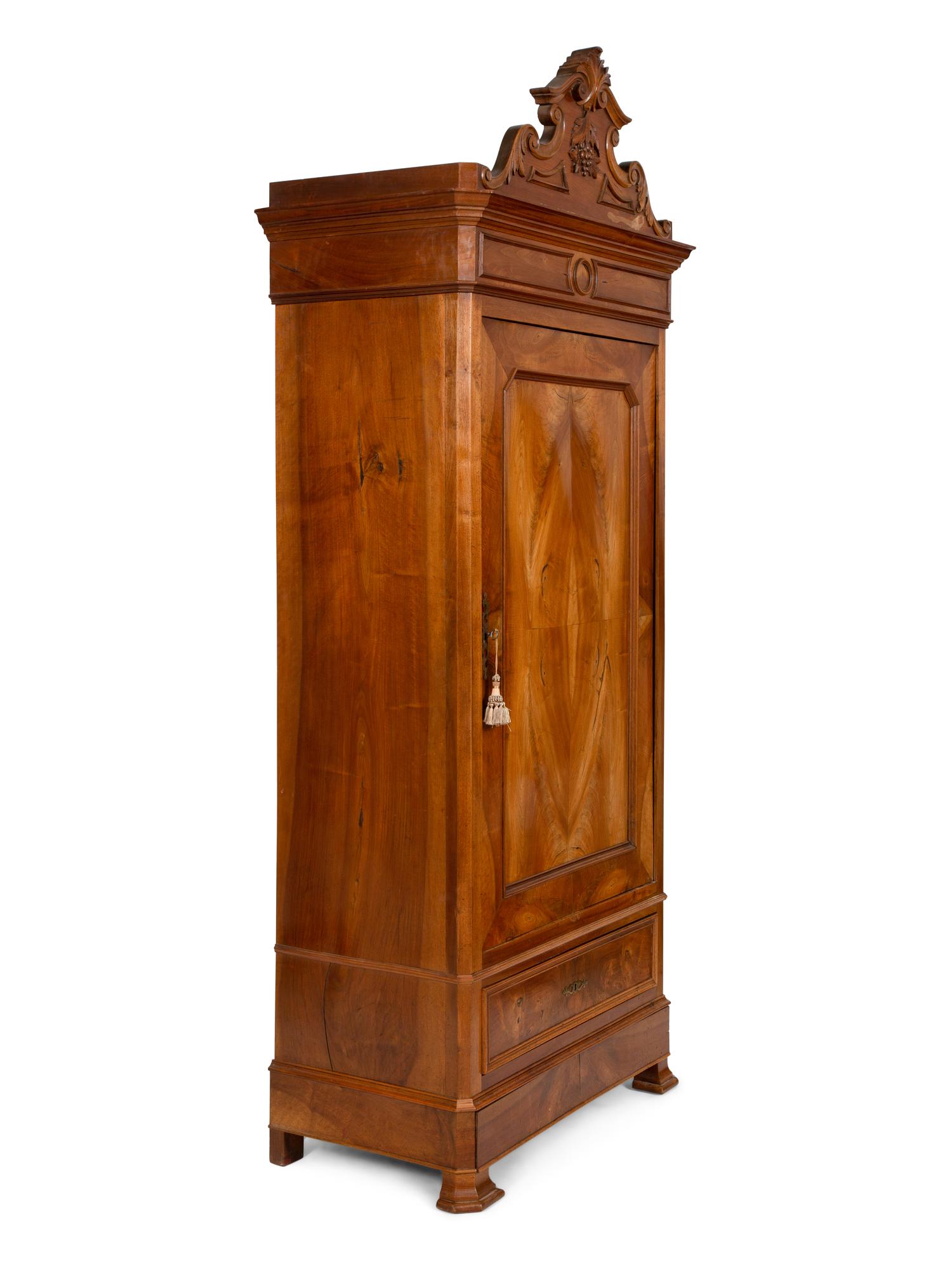 An Italian Figured Walnut Wardrobe Cabinet