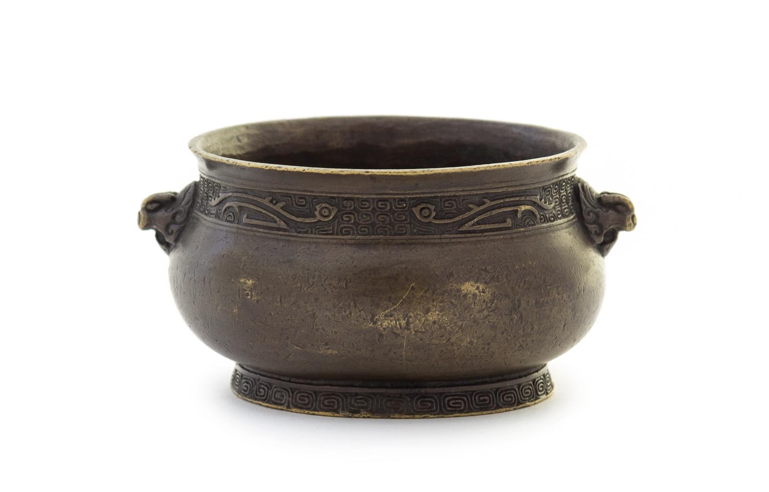 A Bronze Censer Height 2 1/8 x diameter 3 1/2 inches.