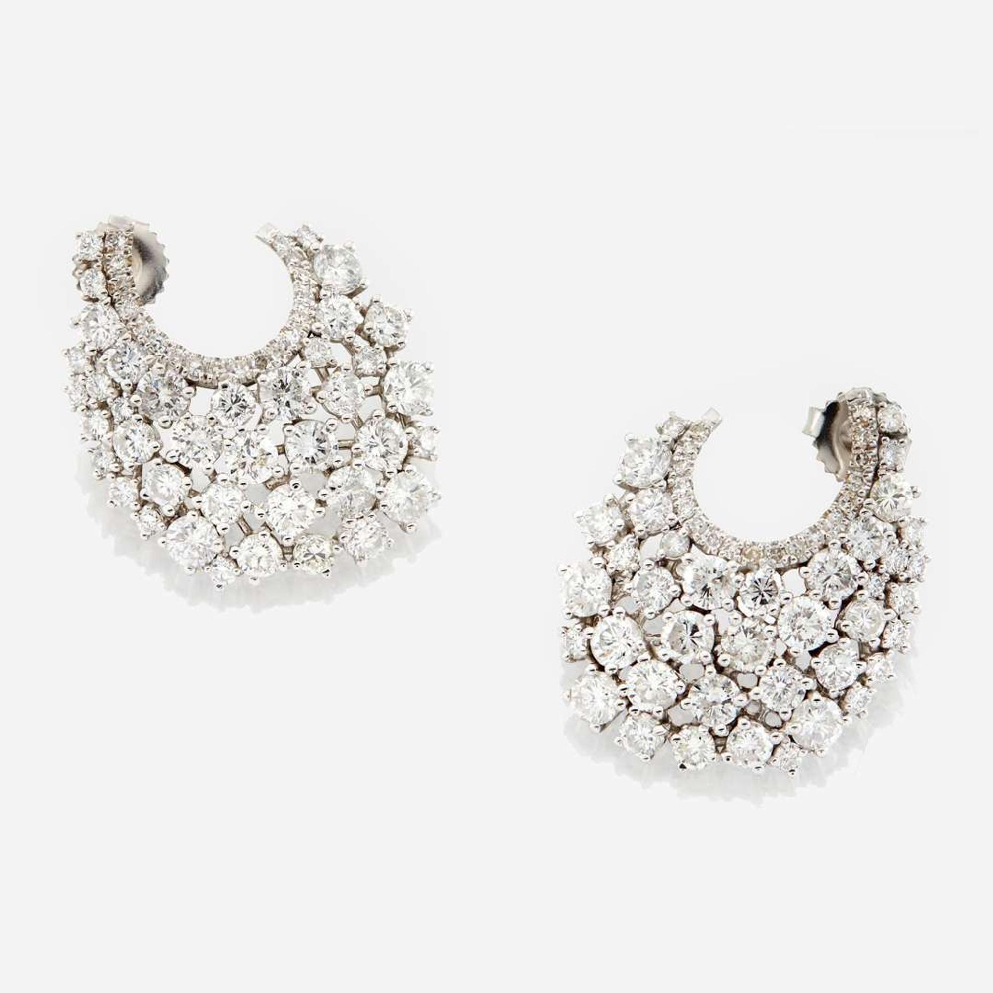 A pair of diamond and white gold earrings