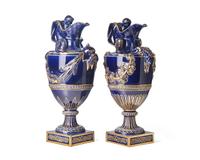 A Pair of Wedgwood Parcel Gilt Cobalt Glazed Ewers