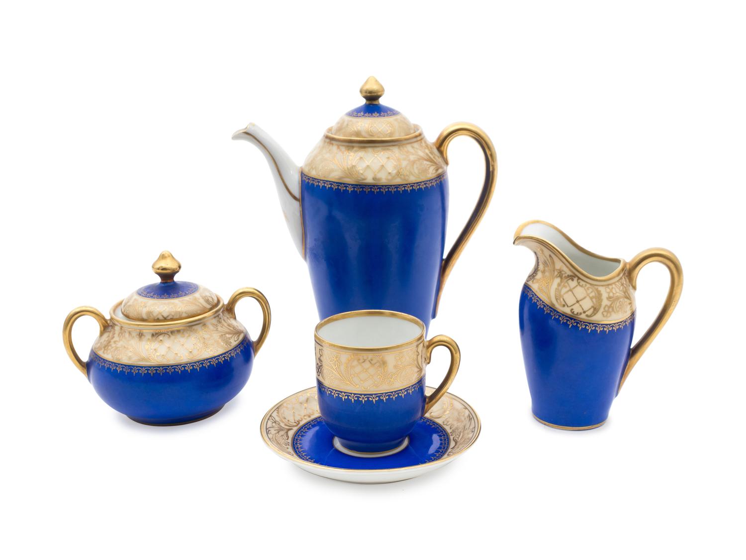 A Dresden Hand Painted Porcelain Demitasse Service — 20TH CENTURY