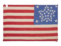 [FLAGS]. 38-star American parade flag with "Great Star" configuration. Ca 1876-1889.