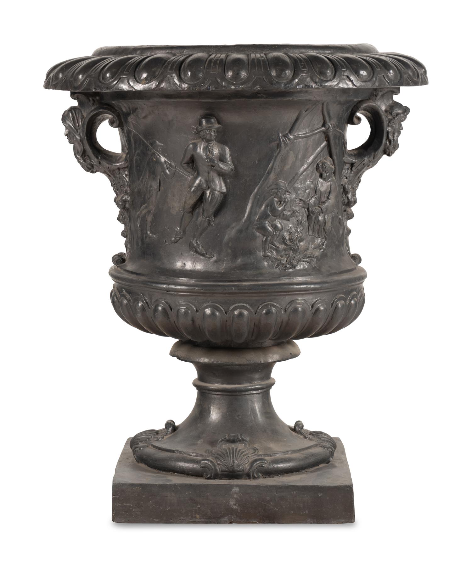 A Pair of English Lead Allegorical Garden Urns