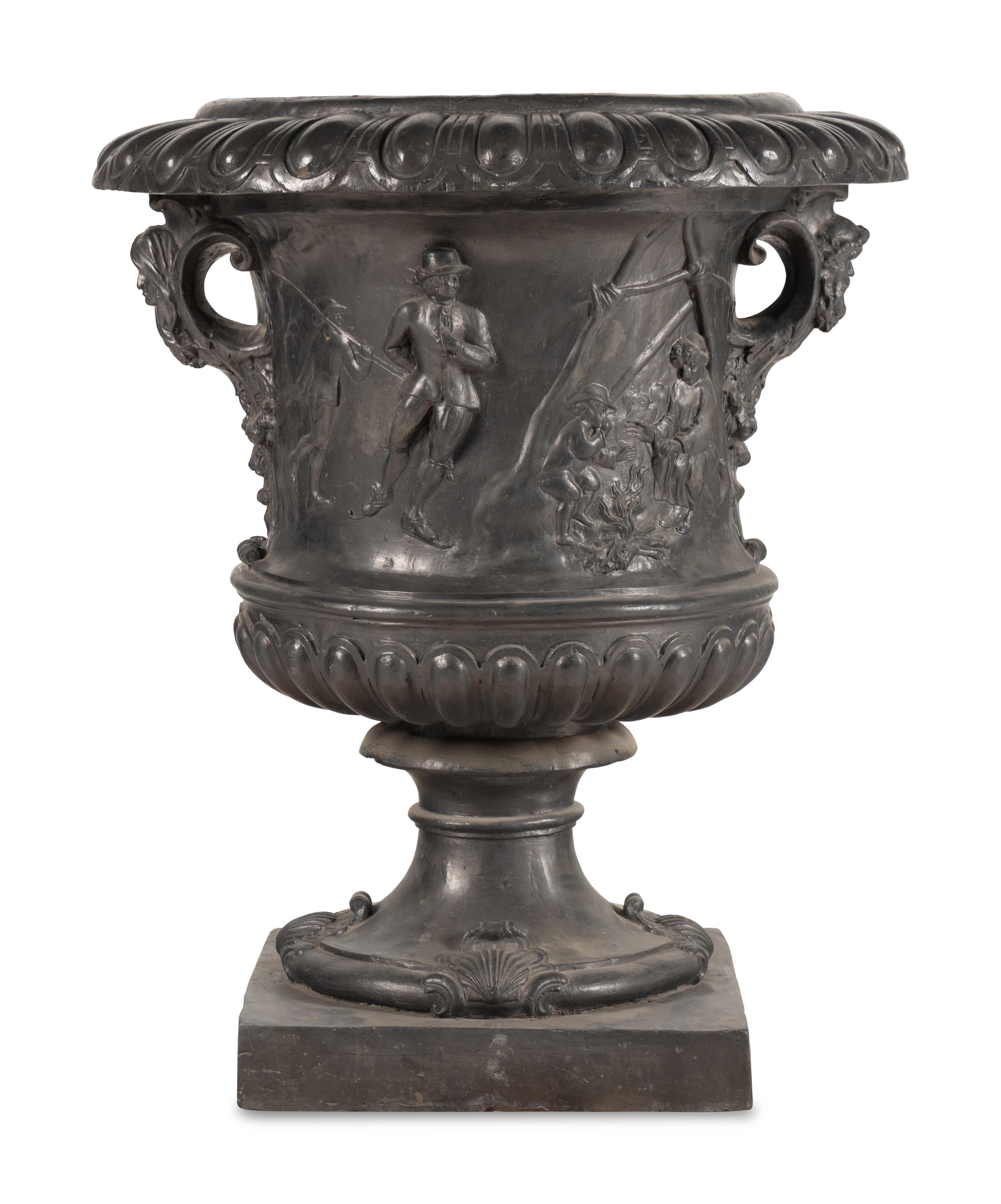 A Pair of English Lead Allegorical Garden Urns