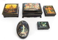 A Group of Five Kholui School Russian Lacquer Boxes Height of largest 3 1/8 x width 7 3/8 x depth 5 1/2 inches.