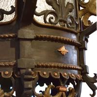 A Bronze and Iron Chandelier from a Chicago Theatre 28" W x 28" D x 75" H — United States, 20th Century