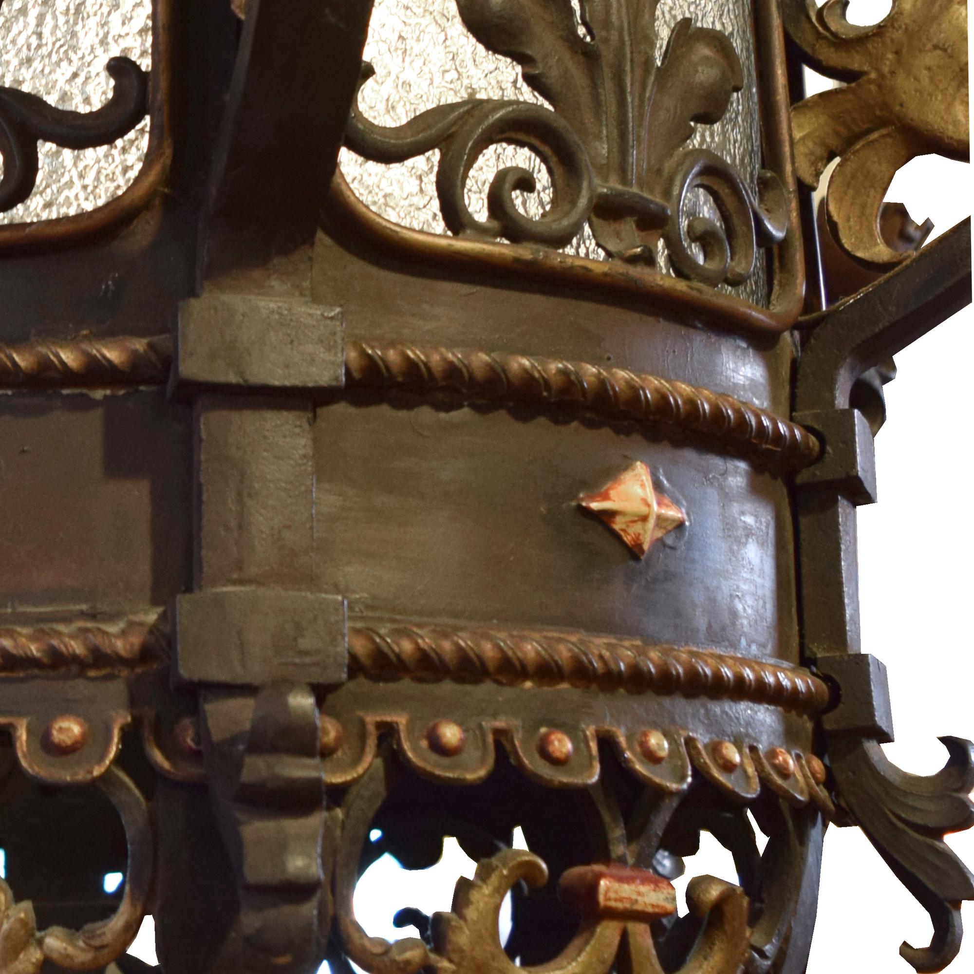 A Bronze and Iron Chandelier from a Chicago Theatre 28" W x 28" D x 75" H — United States, 20th Century