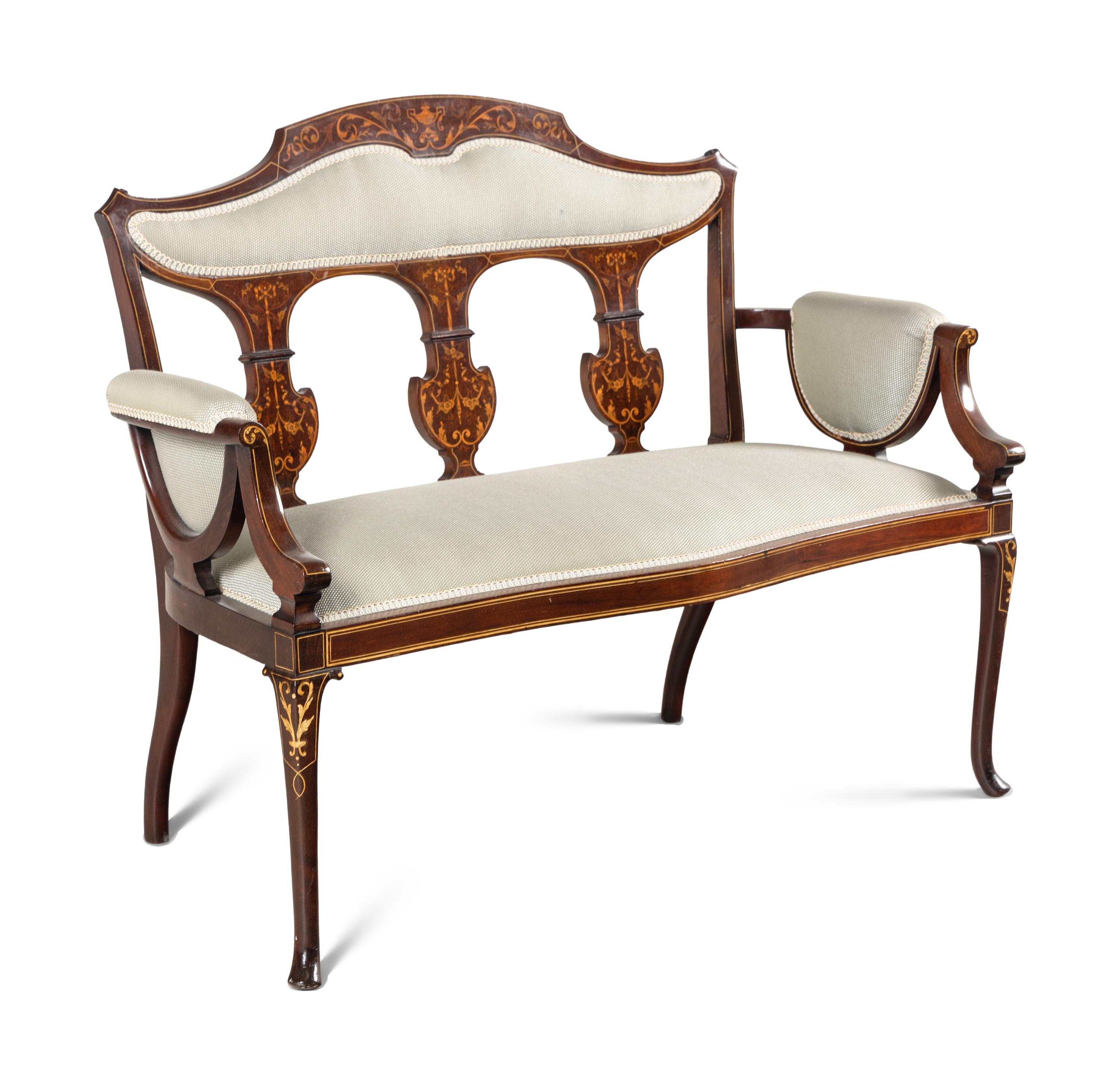 An Edwardian Mahogany and Marquetry Settee