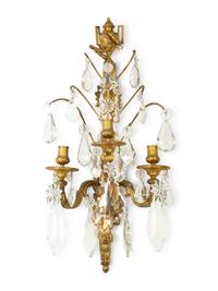 A Pair of Louis XVI Style Gilt Bronze and Cut Glass Three-Light Sconces