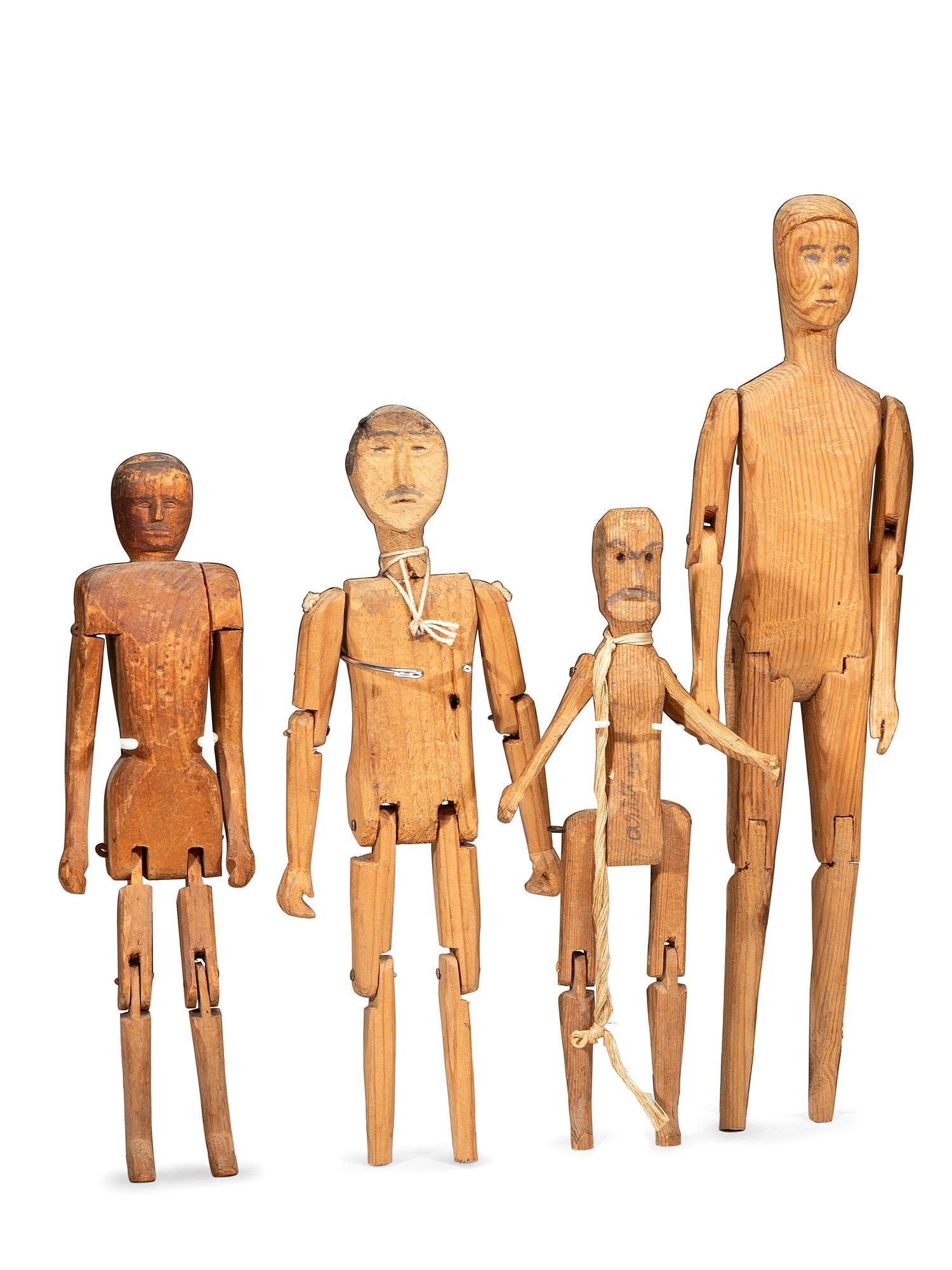 Four Folk Art Carved Wood Articulated Figures