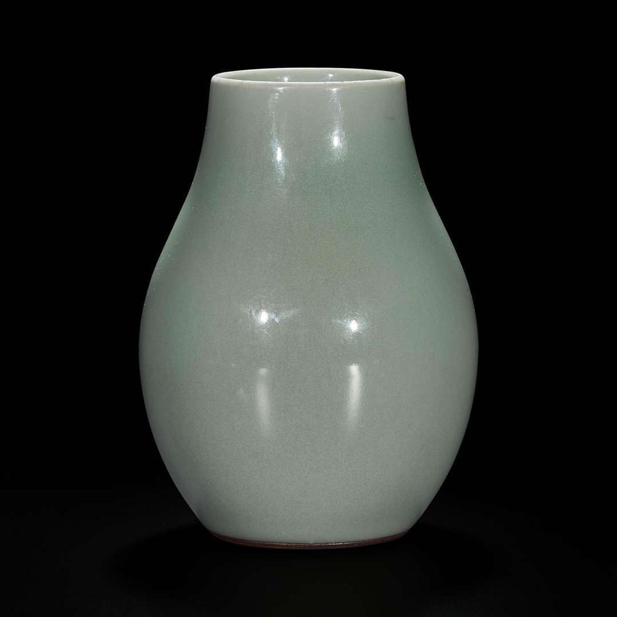 A small Chinese celadon-glazed oviform vase 粉青釉觯一件 Six-character Qianlong seal mark and possibly of the period ????? ?? ??