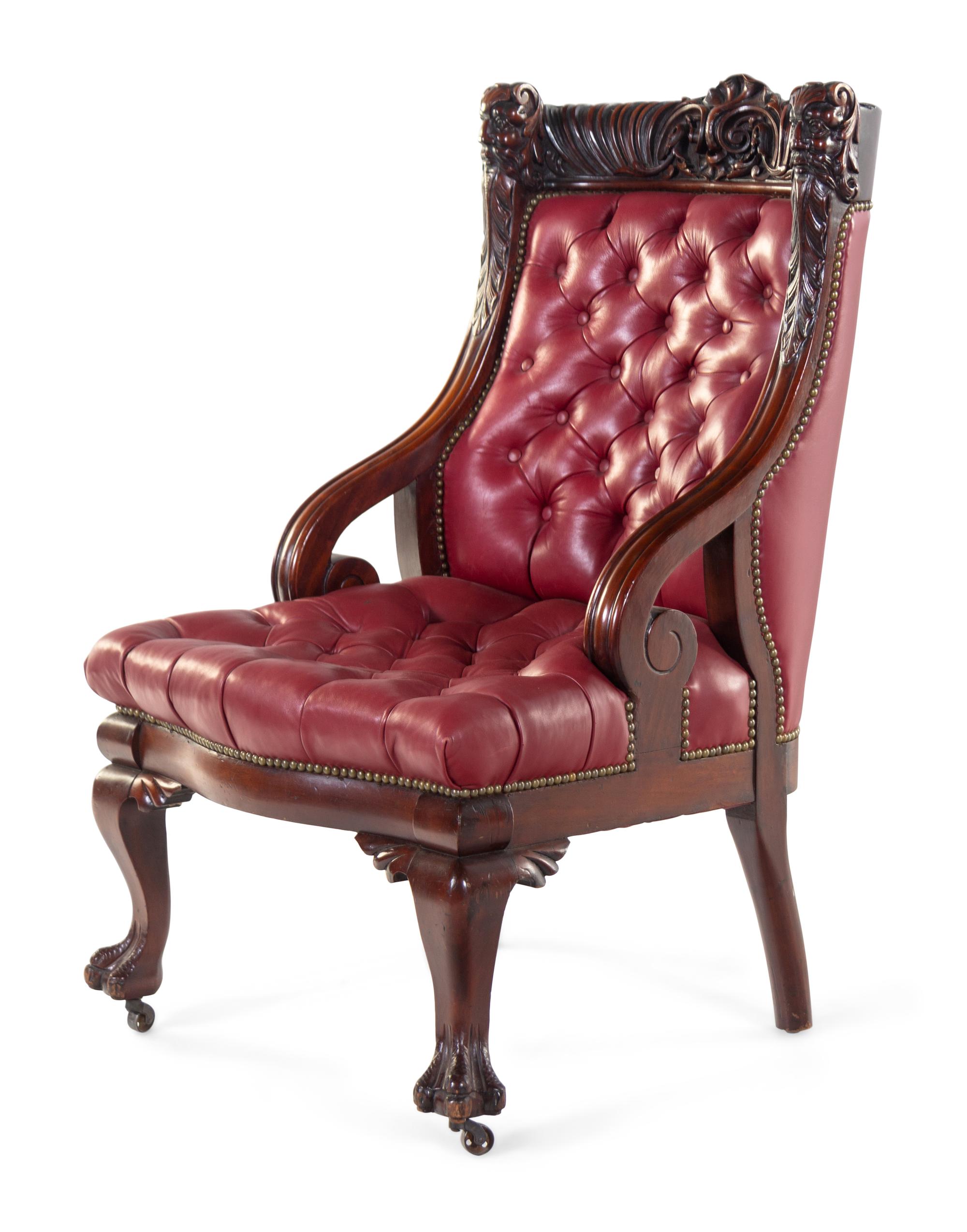 A Renaissance Revival Carved Mahogany Gentleman's and Lady's Chair Set