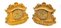 Two Cast Gilt Metal Mantel Clocks