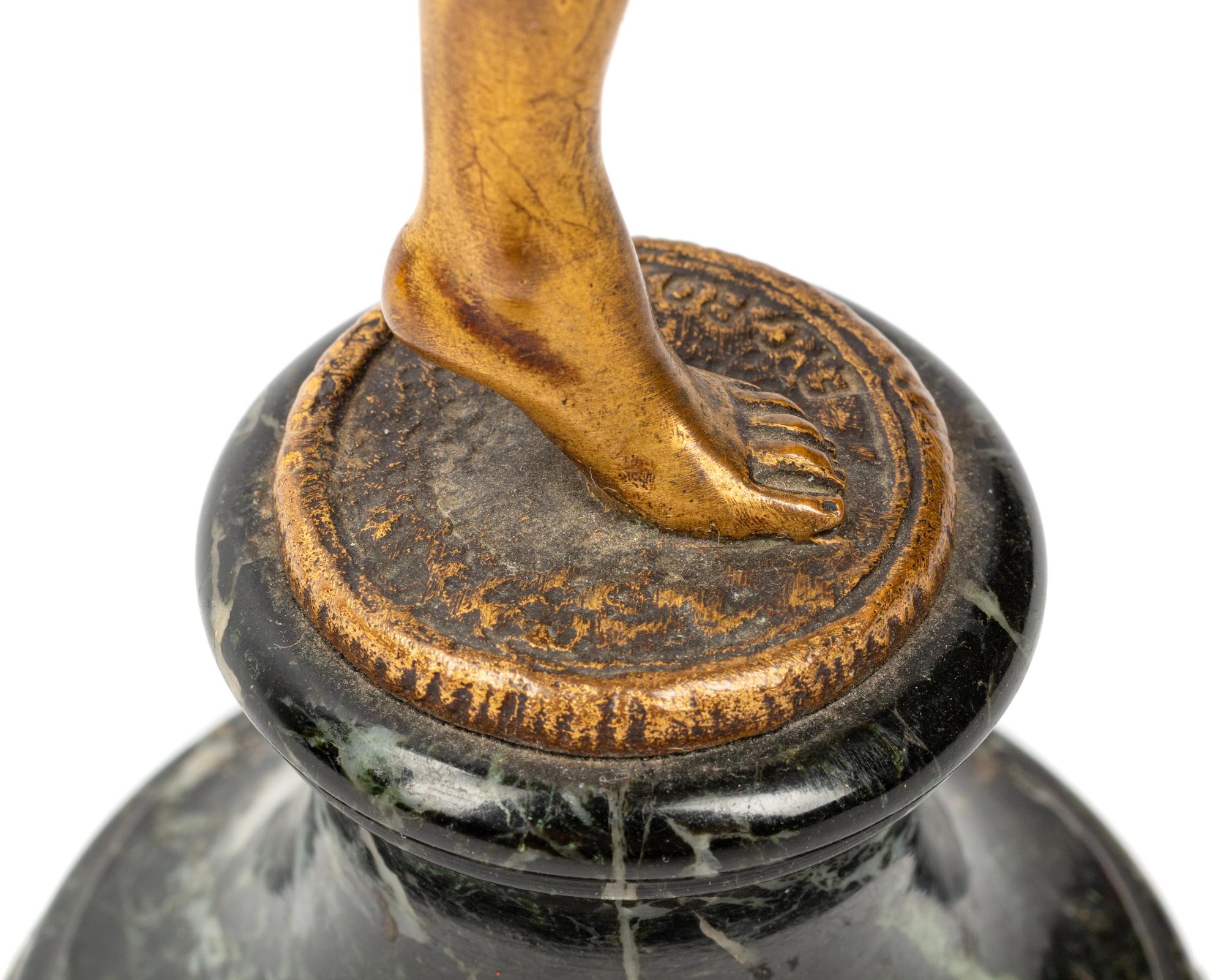 A French Gilt Bronze Figure on a Marble Base