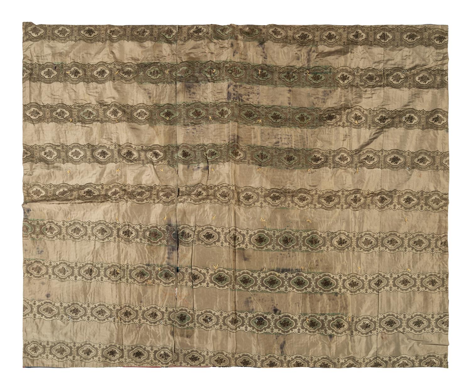 A Pieced Silk 'Courthouse Steps' Pattern Quilt