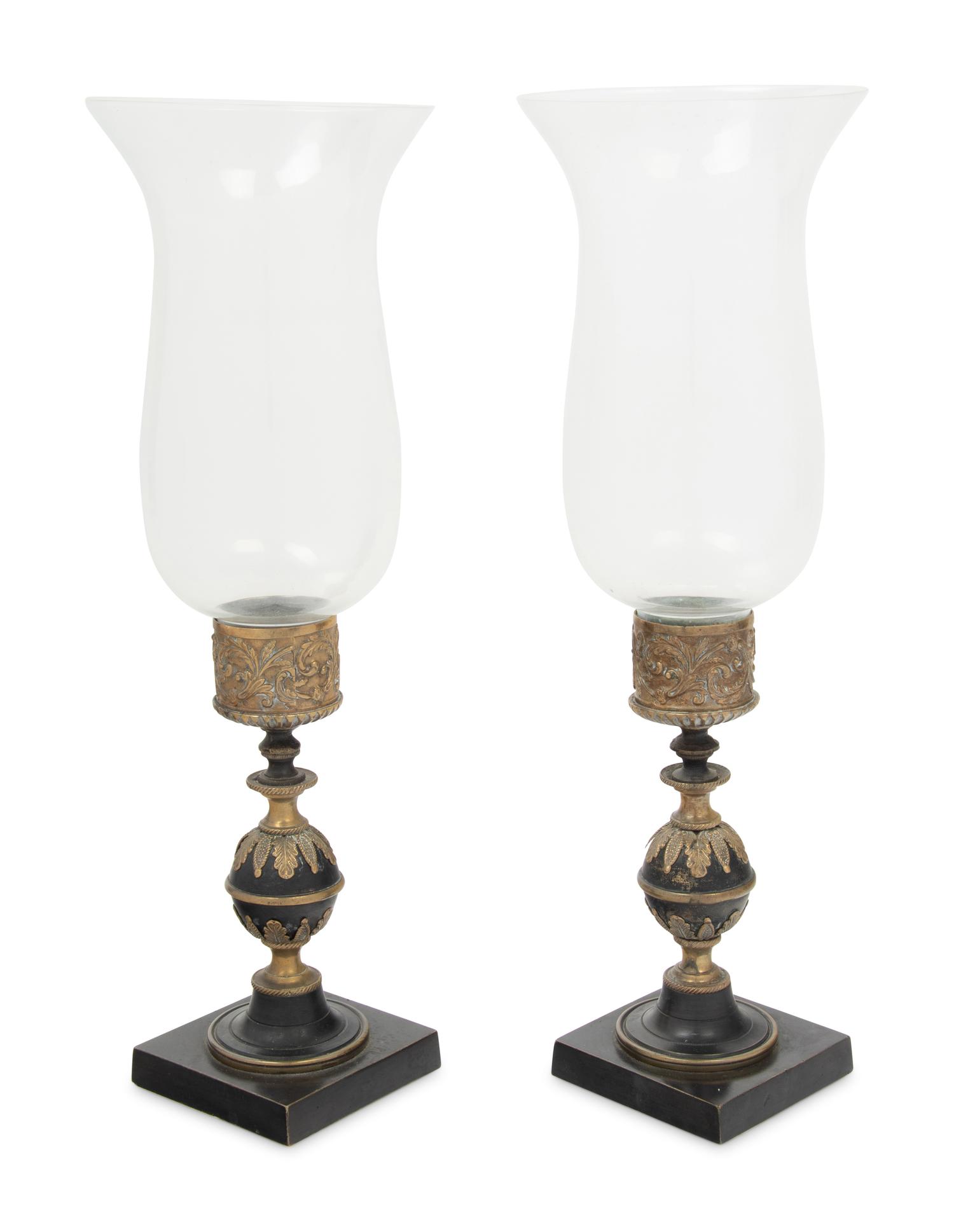 A Pair of Continental Metal Candlesticks