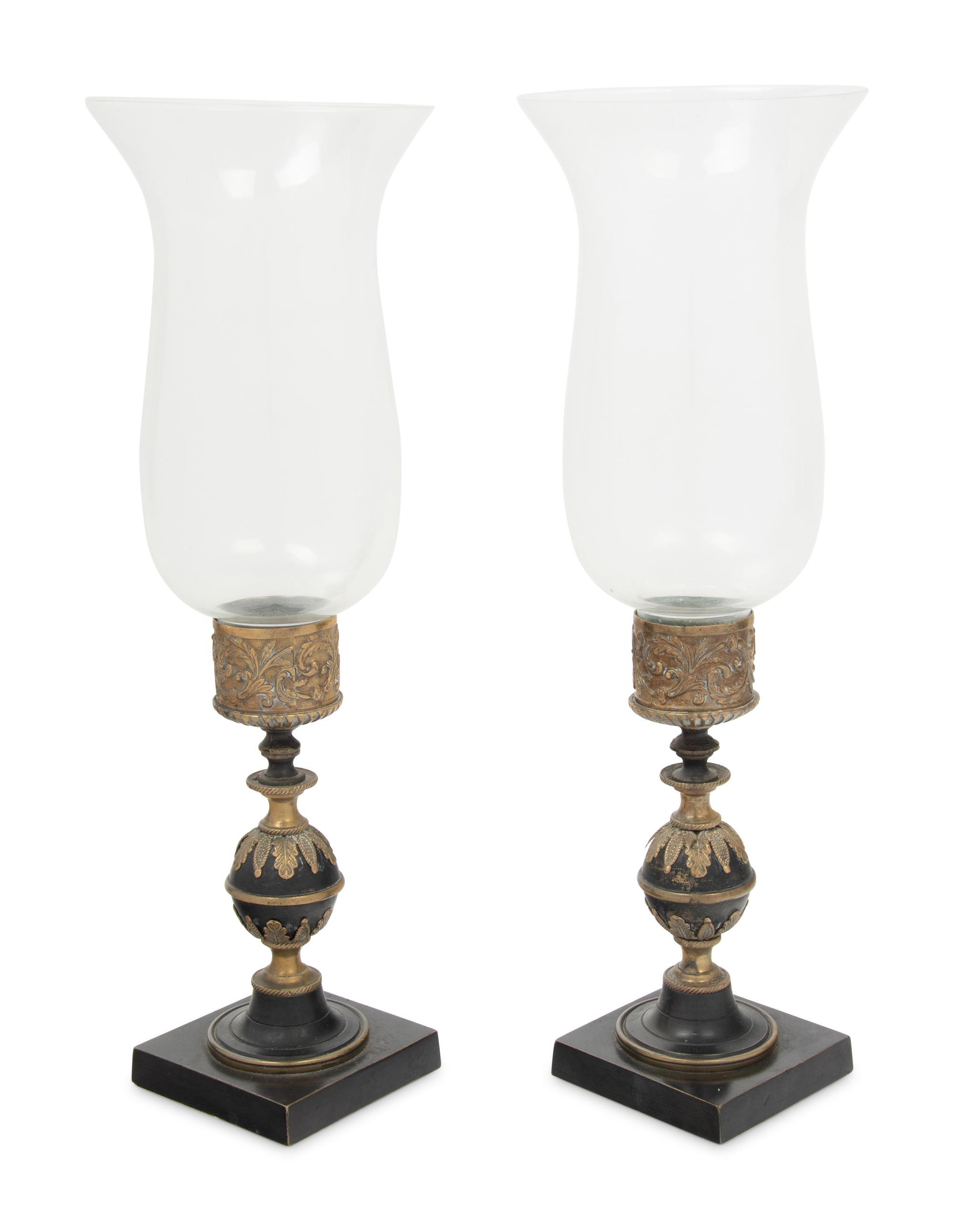 A Pair of Continental Metal Candlesticks