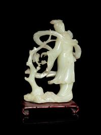 A Chinese Celadon Jade Figure of a Female Immortal