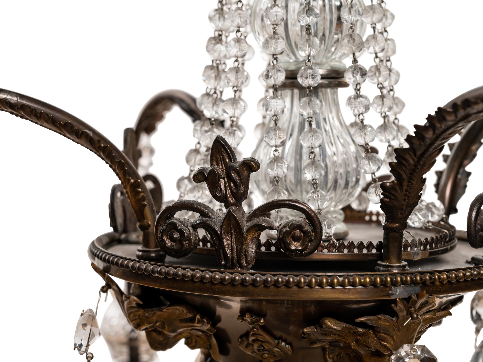 A Continental Bronze and Cut Glass Five-Light Chandelier