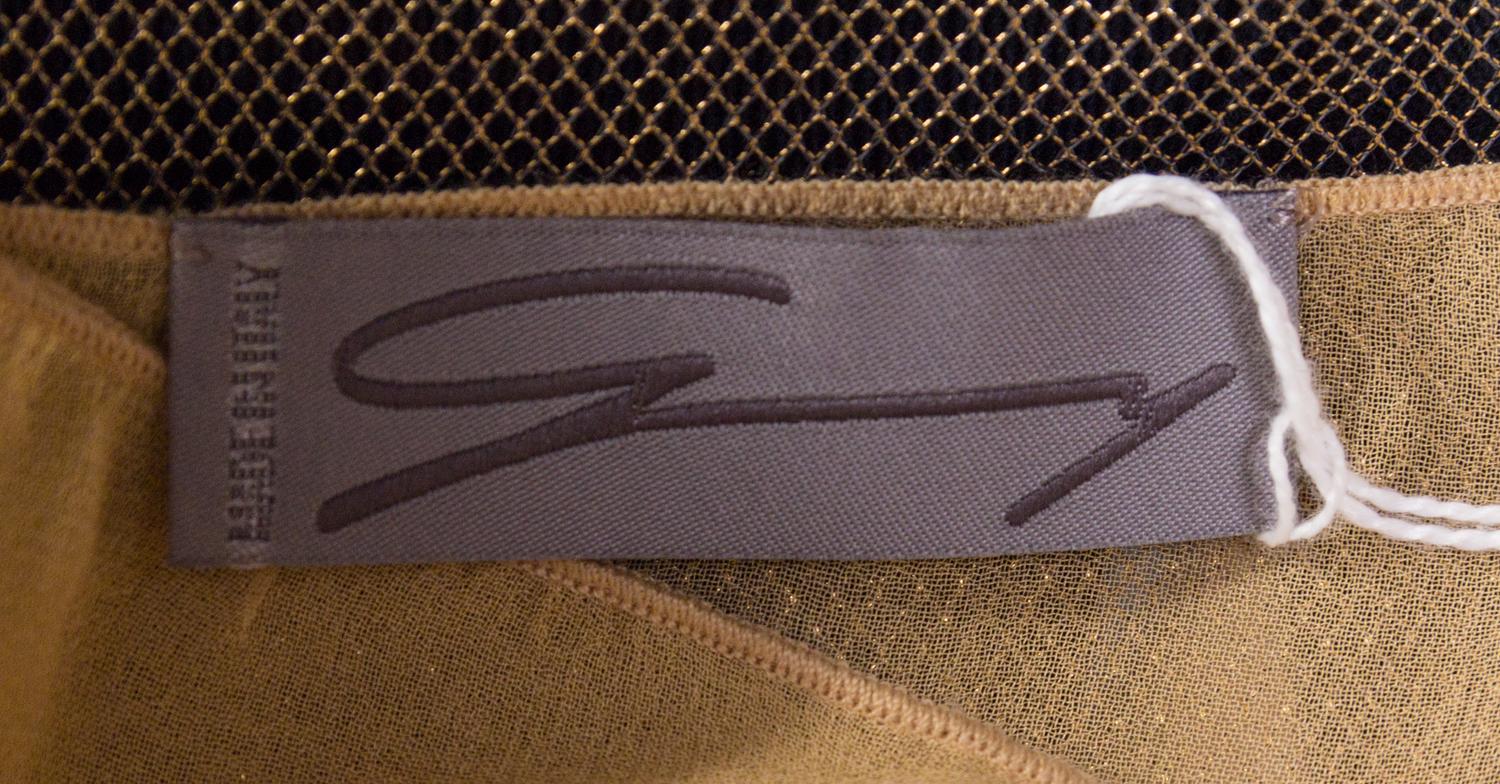 A Genny Gold Sequin Top,