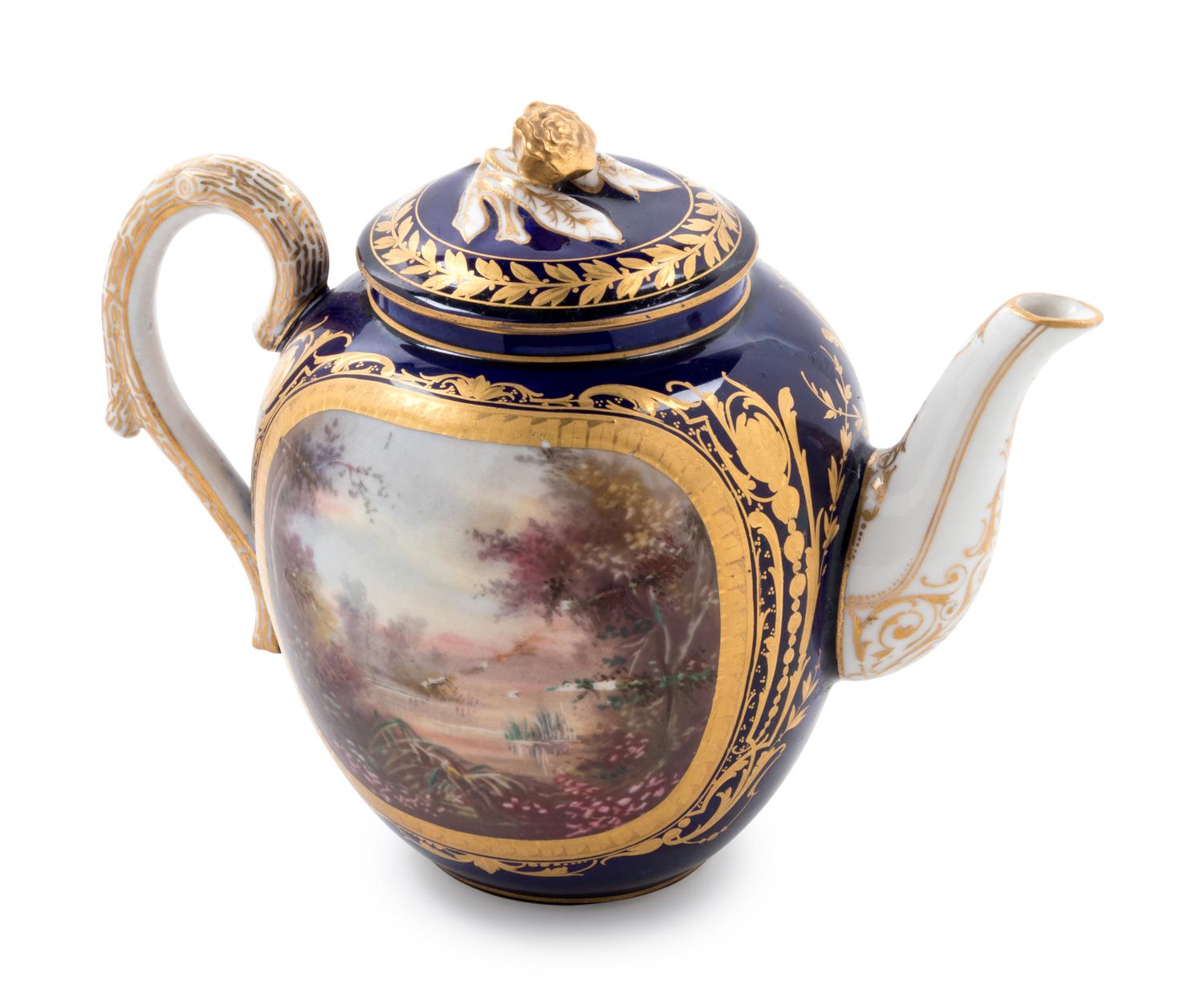 A Sèvres Style Painted, Parcel Gilt and "Jeweled" Porcelain Teapot