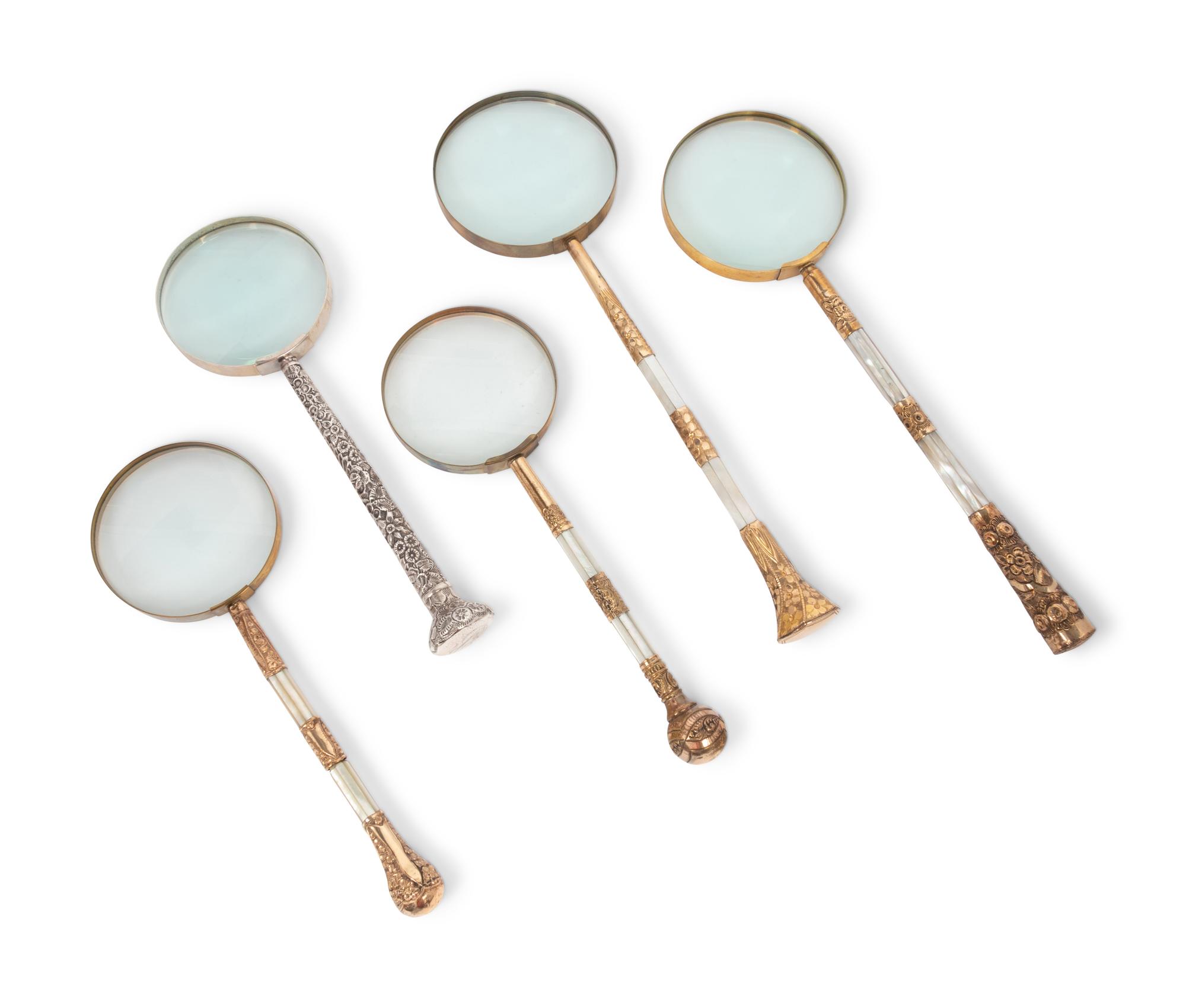 A Group of Five Victorian Parasol Handles Converted to Magnifying Glasses