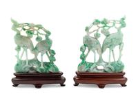 A Pair of Chinese Green and Celadon Jadeite Figural Groups of Cranes