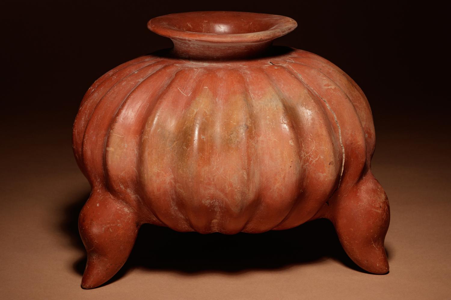 A Colima Terracotta Gadrooned Tripod Vessel
