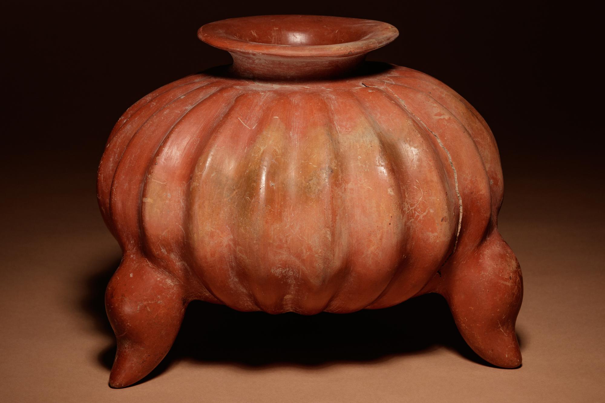 A Colima Terracotta Gadrooned Tripod Vessel