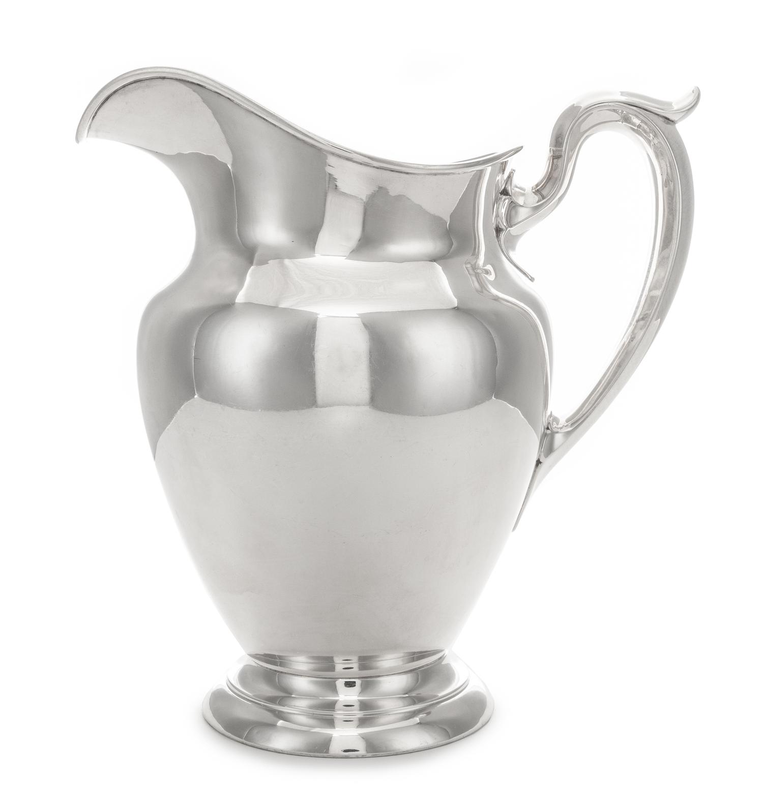 An American Silver Water Pitcher, Gorham Mfg. Co., Providence, RI, 1943, of plain vase form with an upswung loop handle.