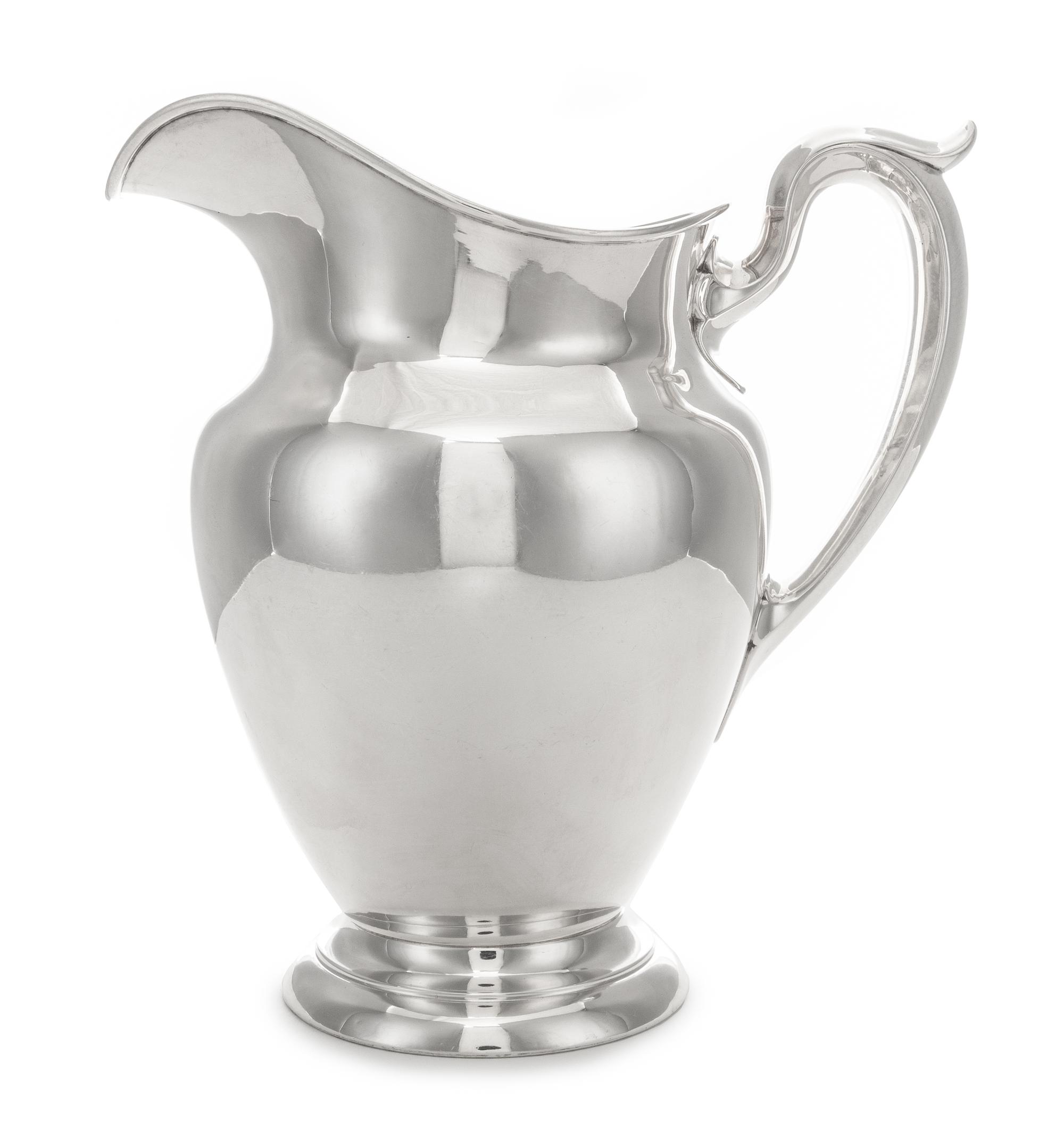 An American Silver Water Pitcher, Gorham Mfg. Co., Providence, RI, 1943, of plain vase form with an upswung loop handle.
