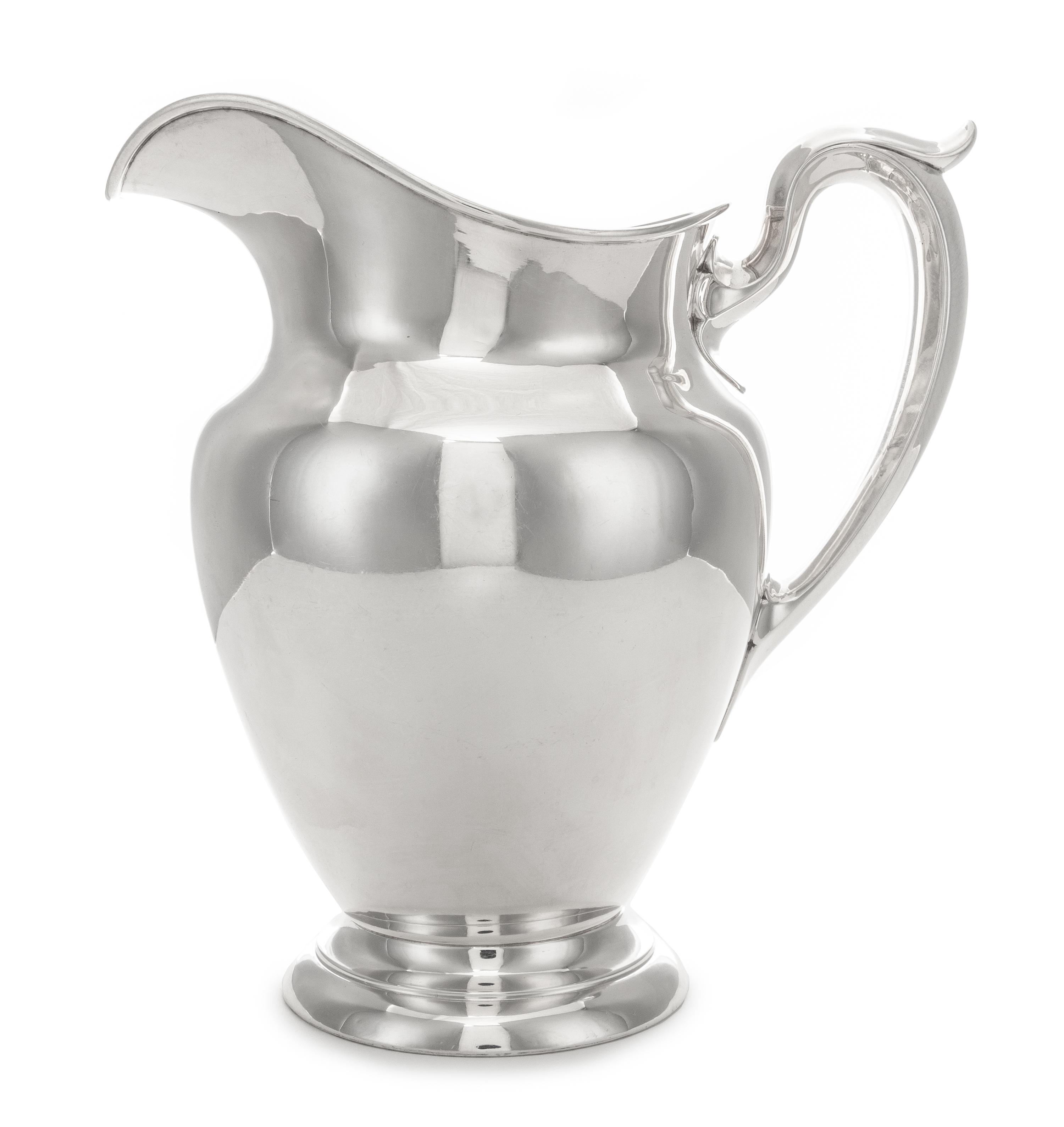An American Silver Water Pitcher, Gorham Mfg. Co., Providence, RI, 1943, of plain vase form with an upswung loop handle.