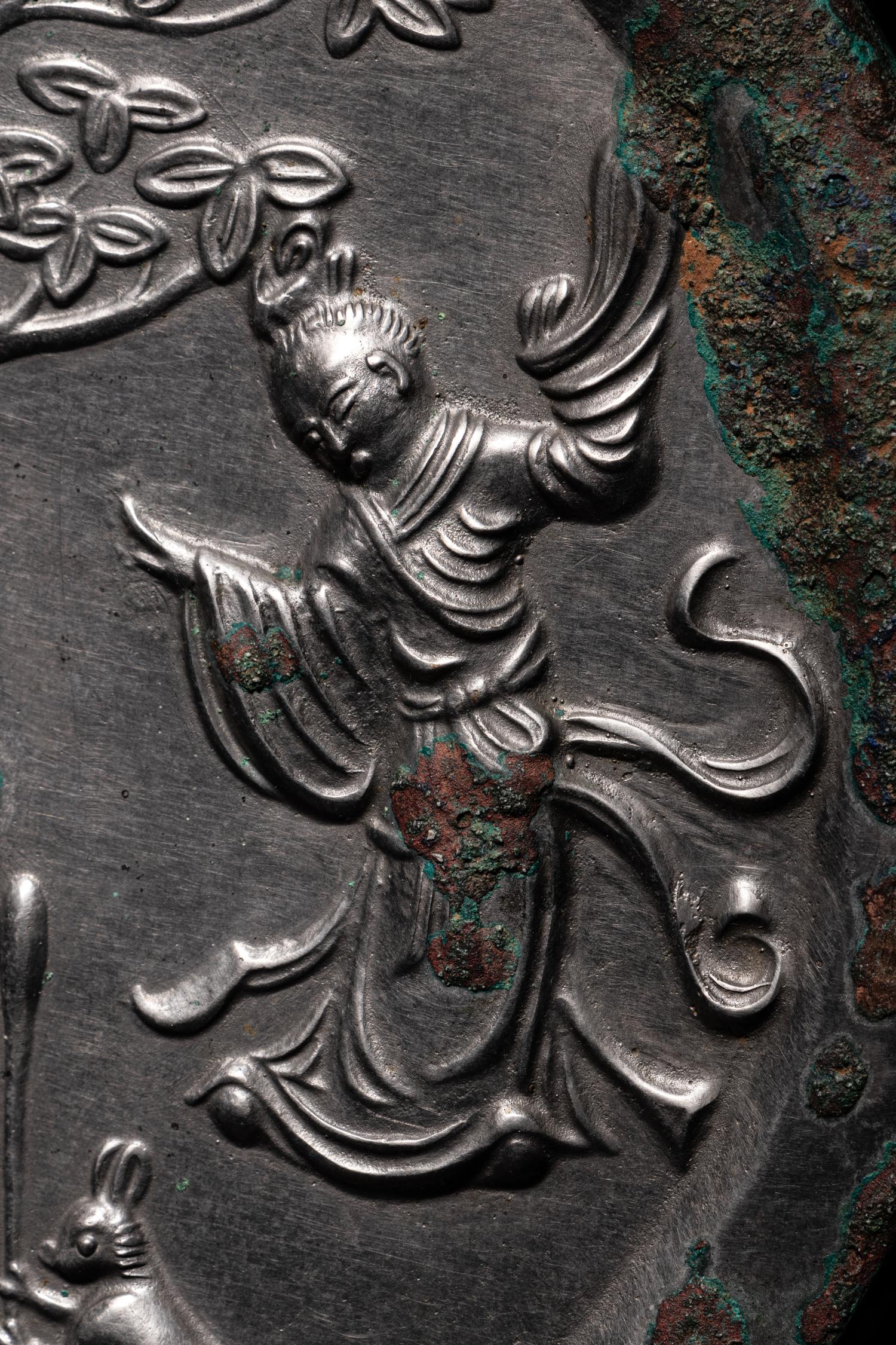A Bronze 'Moon Palace' Mirror
