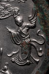 A Bronze 'Moon Palace' Mirror