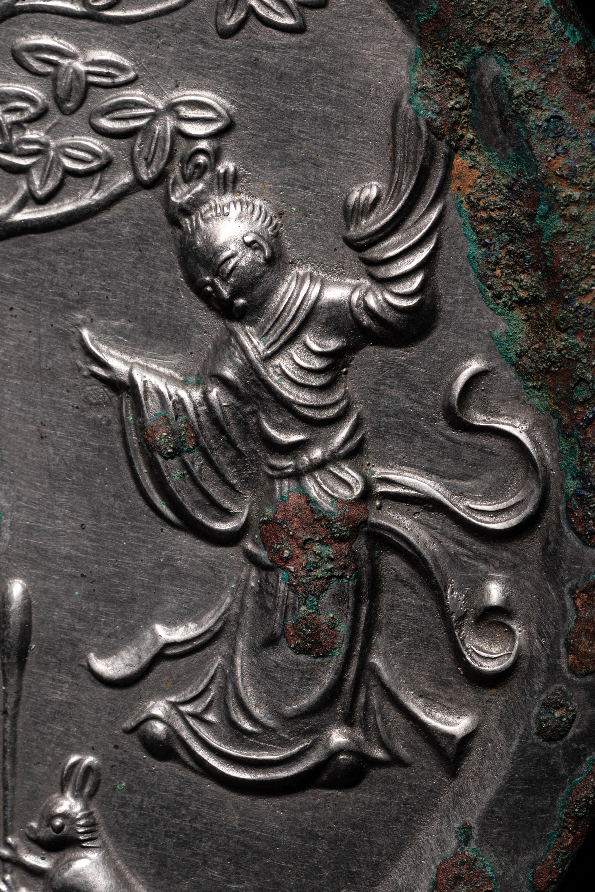 A Bronze 'Moon Palace' Mirror
