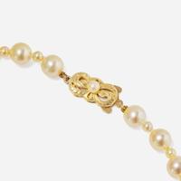 A Pair of 18K Yellow Gold and Pearl Earrings and a Mikimoto Pearl Necklace