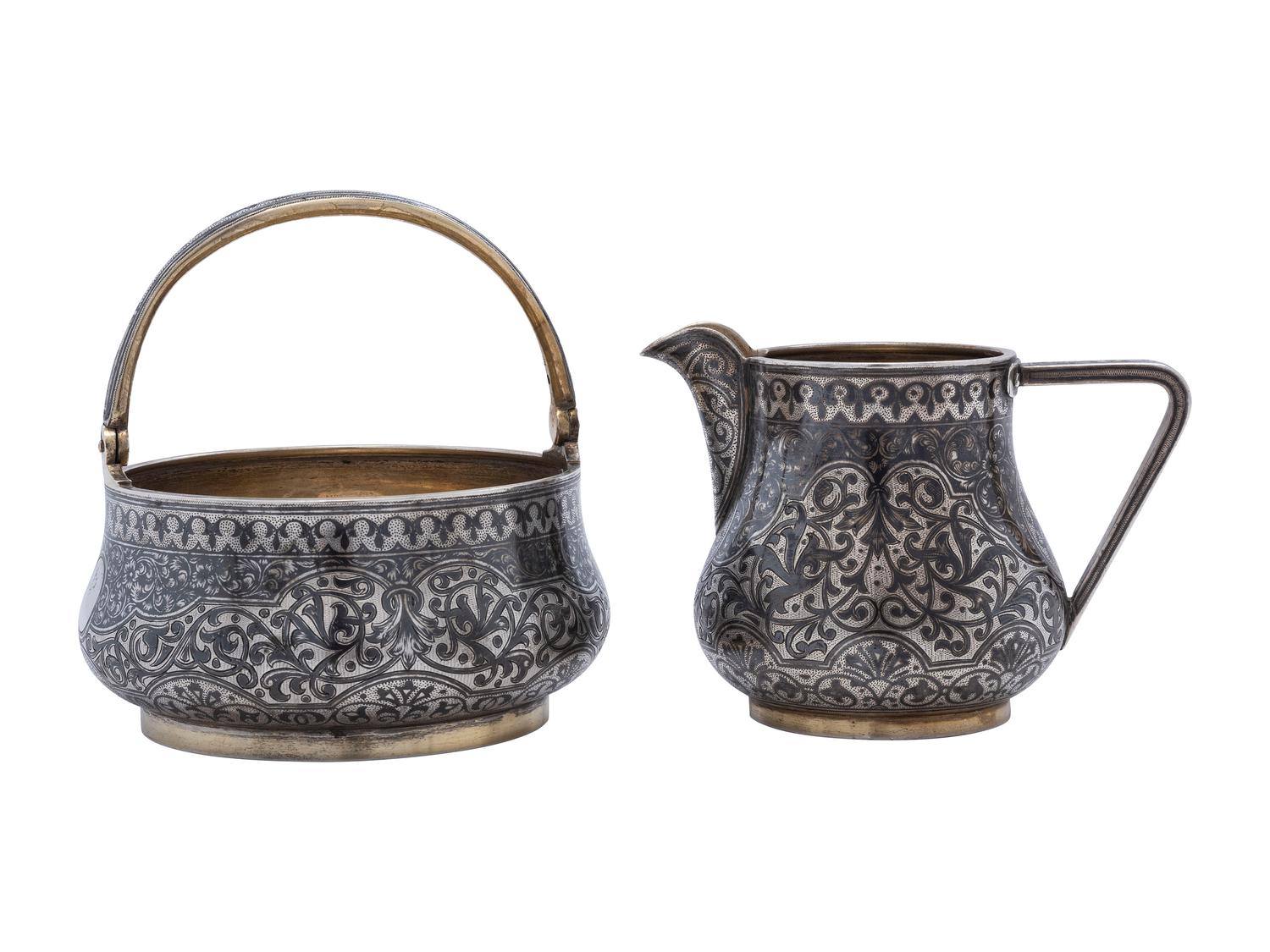 A Russian Niello Inlaid Silver Four-Piece Serving Set