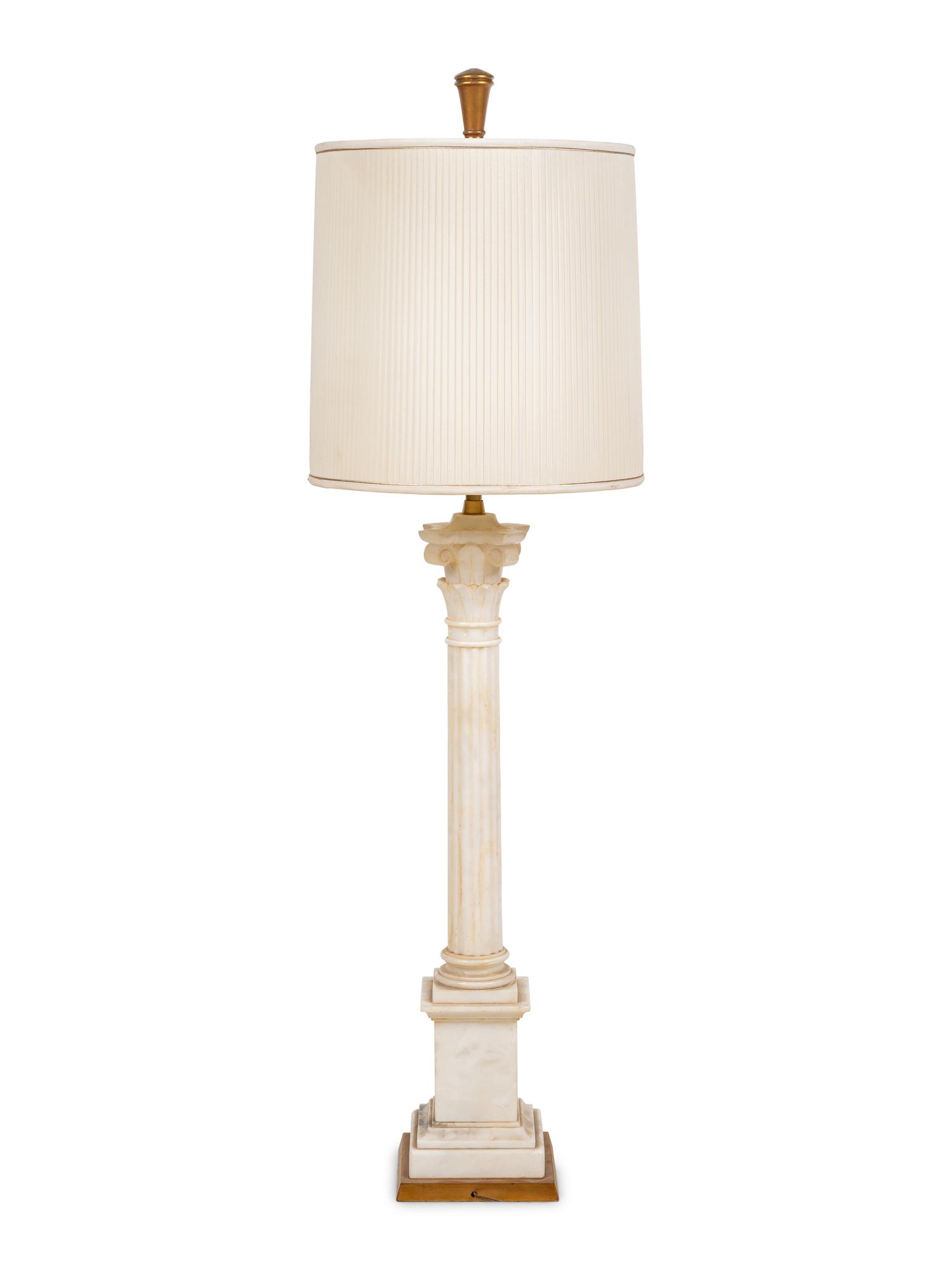 A Carved Marble Columnar Lamp