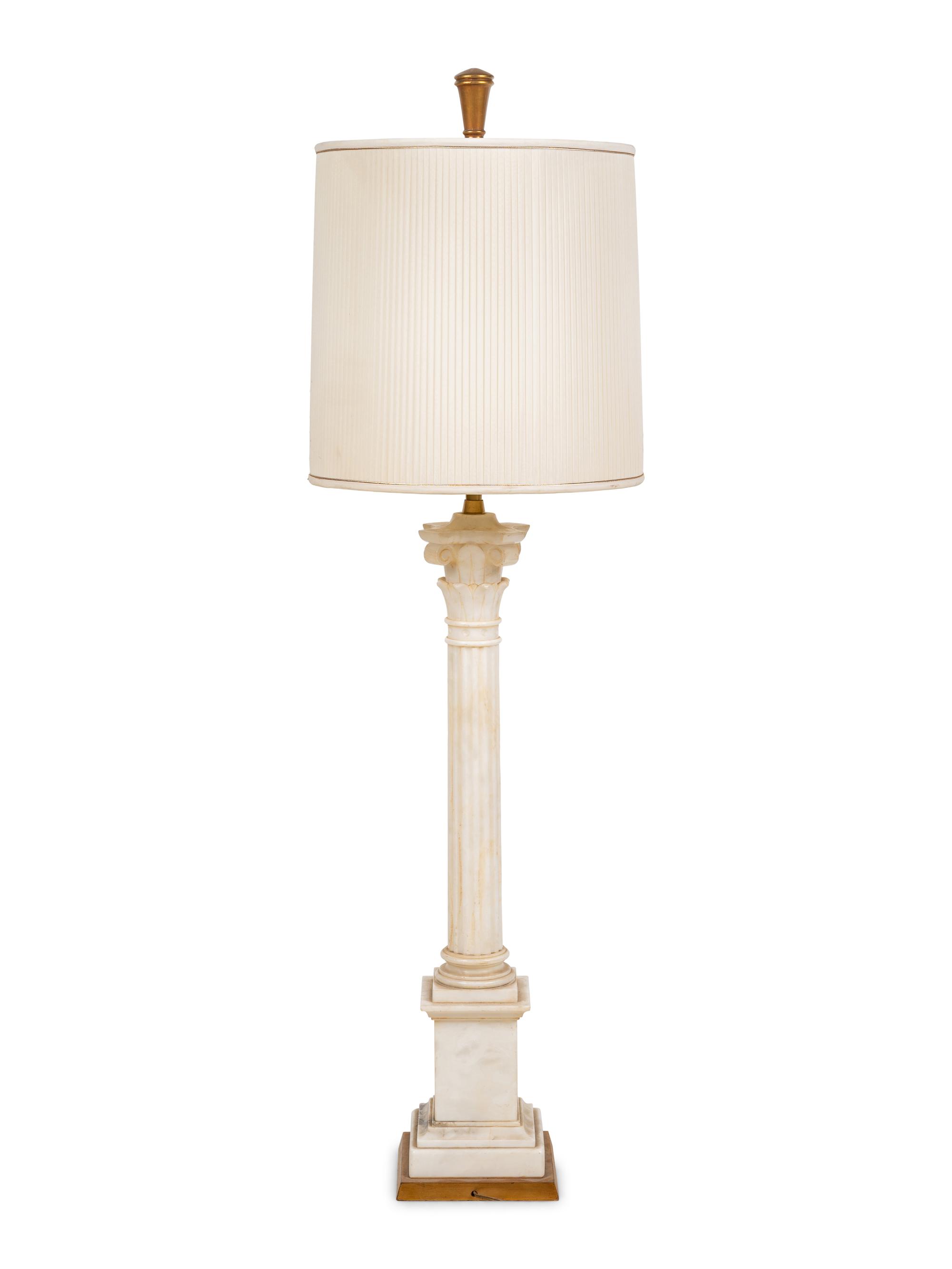 A Carved Marble Columnar Lamp