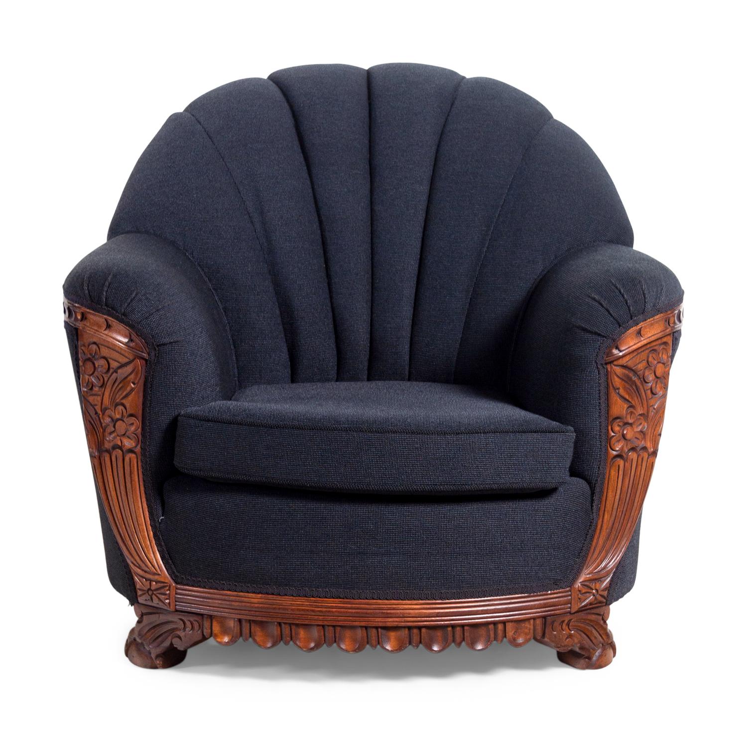 An Art Deco Style Carved Walnut Sofa and Armchair
