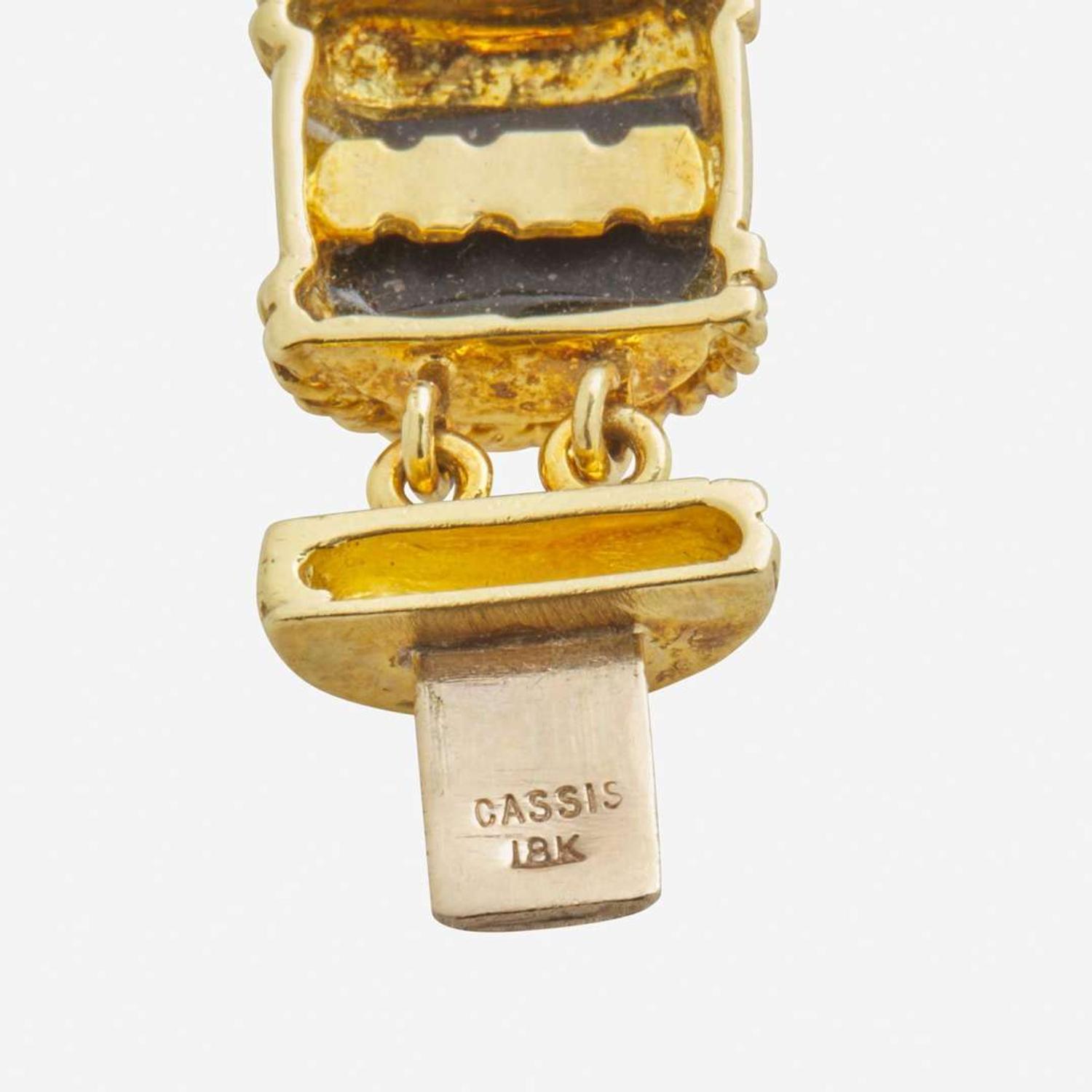 An 18K Yellow Gold, Onyx, and Diamond Bracelet