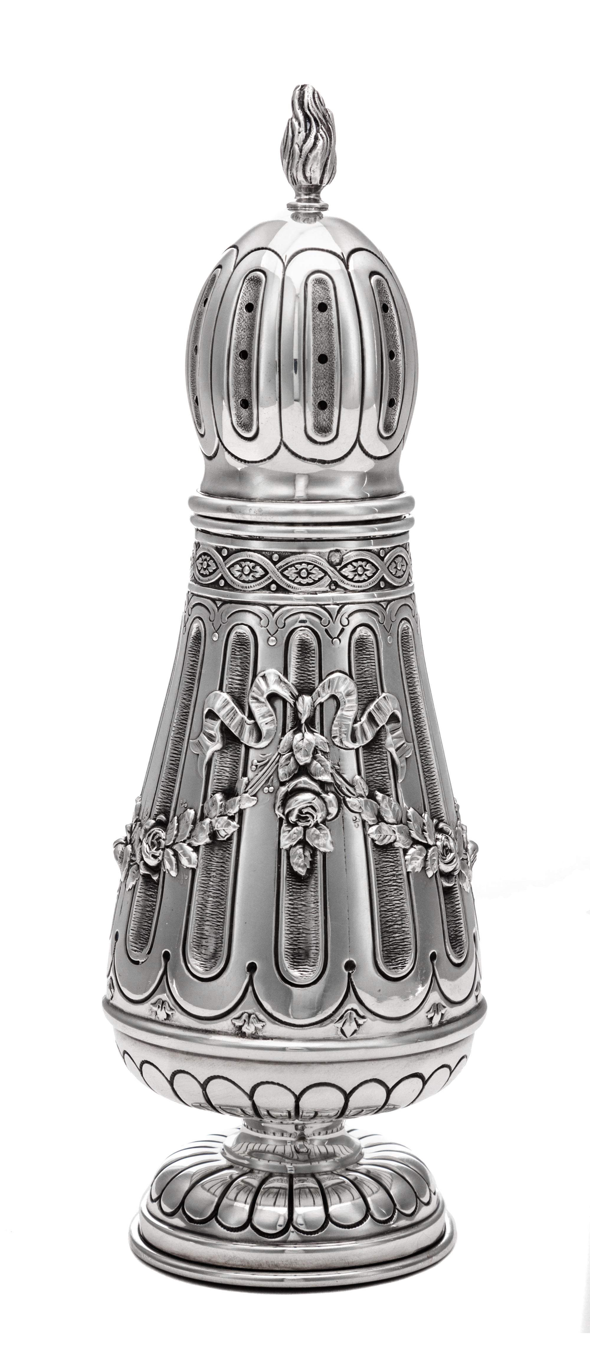 A French Silver Muffineer, Ernest Eschwege, Paris, Late 19th/Early 20th Century, having a flame finial above the fluted body with repou
