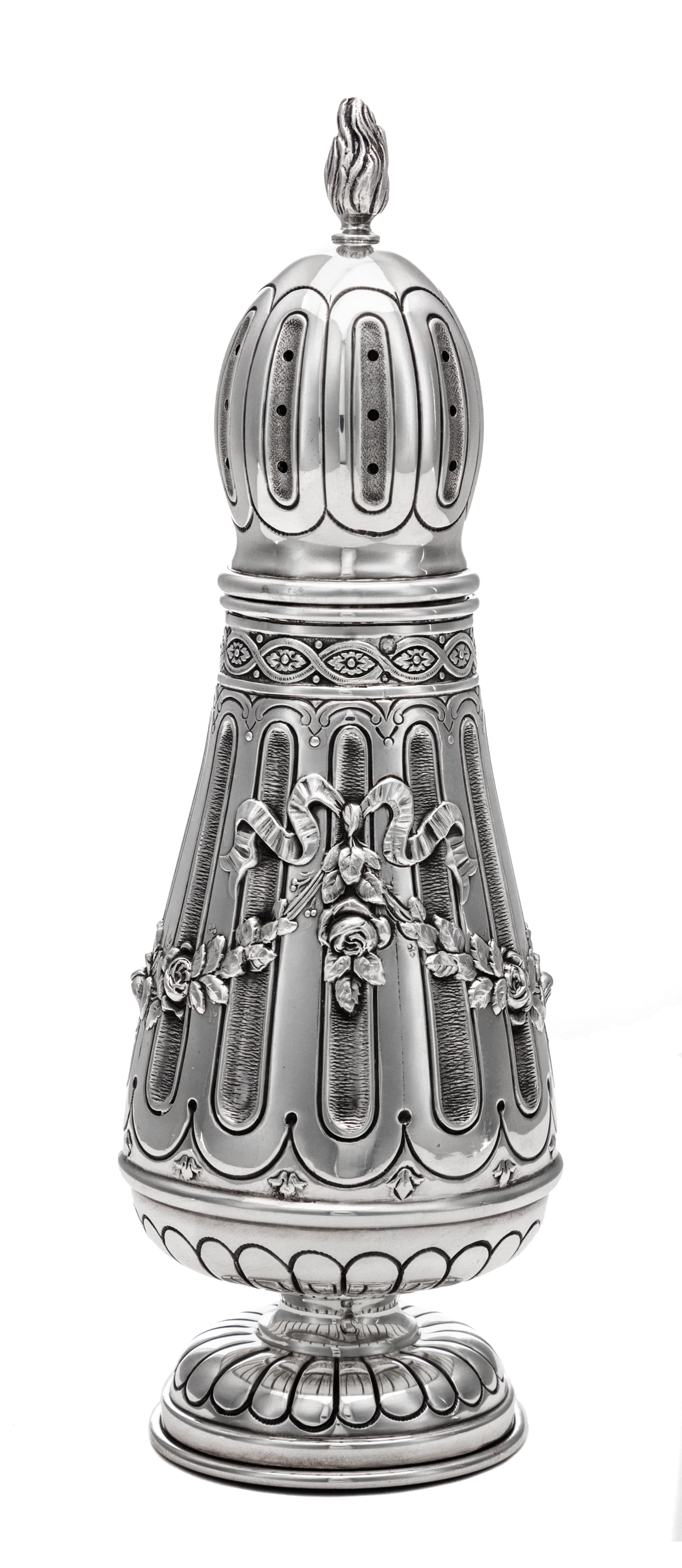 A French Silver Muffineer, Ernest Eschwege, Paris, Late 19th/Early 20th Century, having a flame finial above the fluted body with repou
