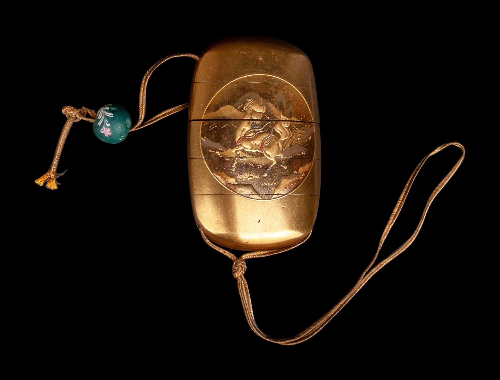 A Japanese Gold Lacquer Four-Case Inro