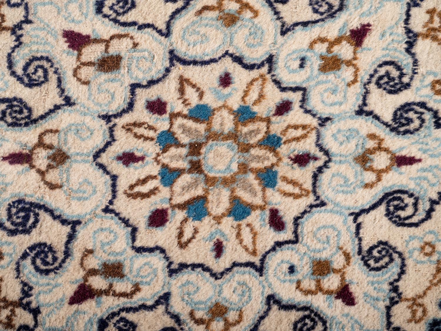 A Persian Nain Wool Rug