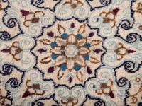 A Persian Nain Wool Rug