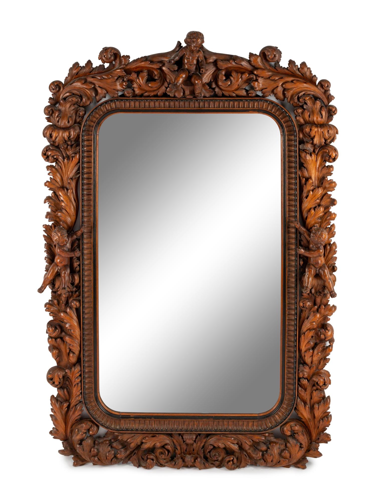 An Italian Carved Walnut Mirror