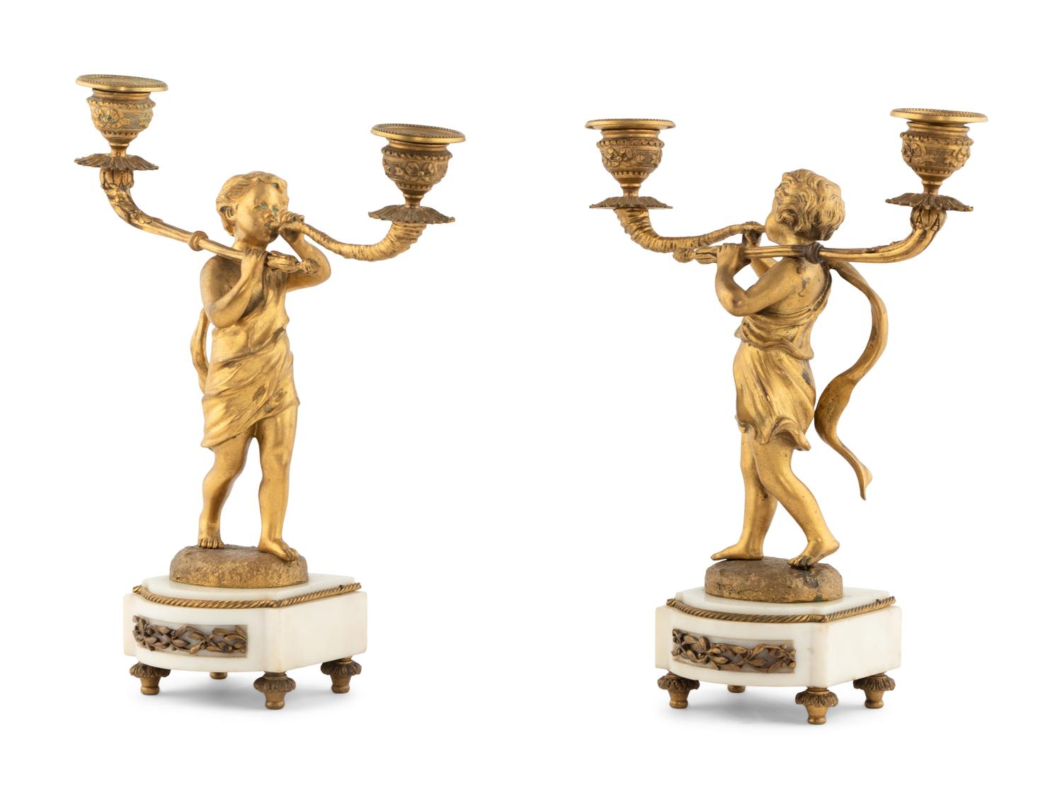 A Pair of French Gilt Bronze Figural Two-Light Candelabra